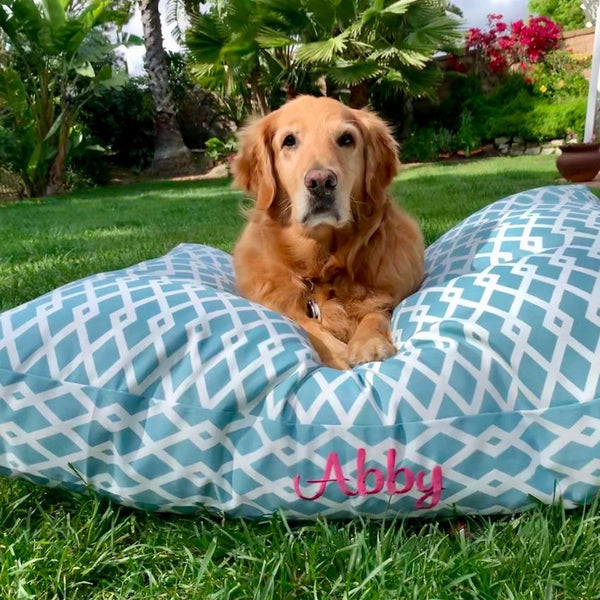 three_spoiled_dogs_outdoor_dog_bed_in_aqua_embroidered_with_abby_a_golden_retriever
