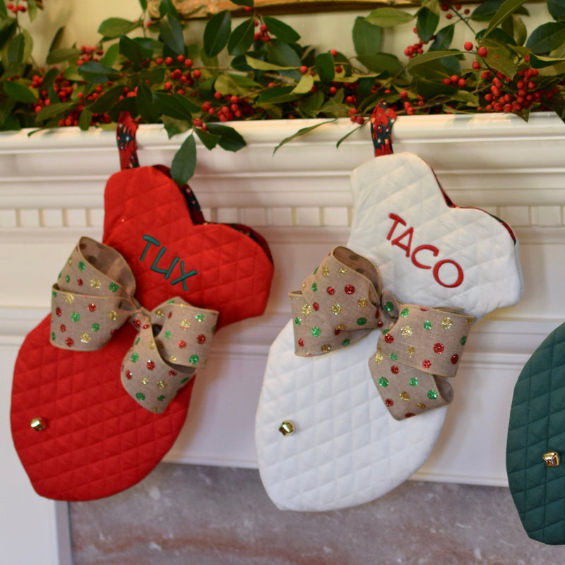 three spoiled dogs embroidered christmas stockings in the shape of a fish with custom bows