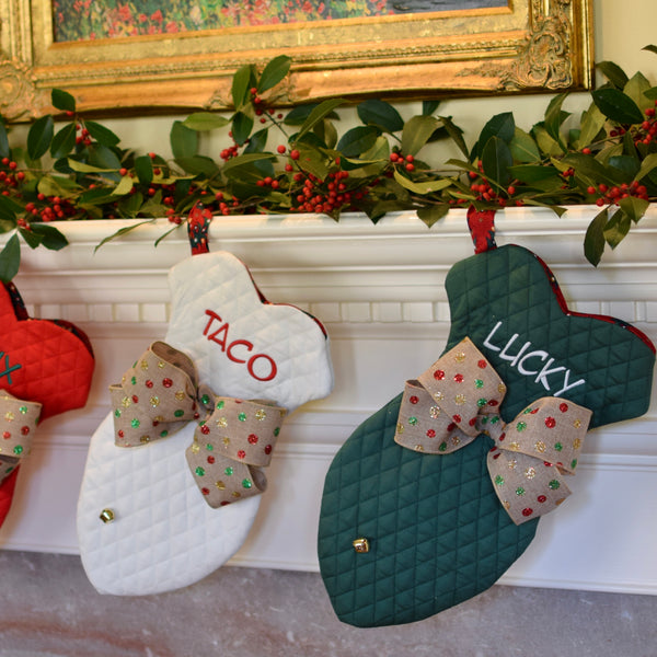 three spoiled dogs embroidered christmas stockings in the shape of a fish with custom bows