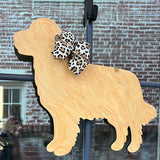 three spoiled dogs customizable golden retriever welcome door hanger with a leopard bow hanging on a front door