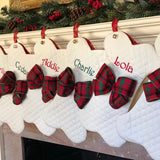 three spoiled dogs embroidered christmas stockings in the shape of a dog bone with custom bows