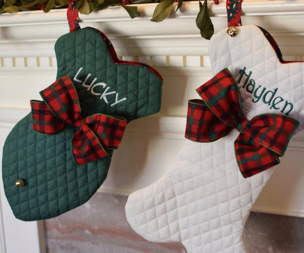 three spoiled dogs embroidered christmas stockings in the shape of a fish and dog bone with custom bows