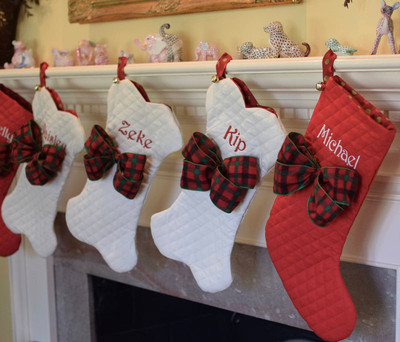 three spoiled dogs embroidered christmas stockings in the shape of a dog bone and traditional shape with custom bows